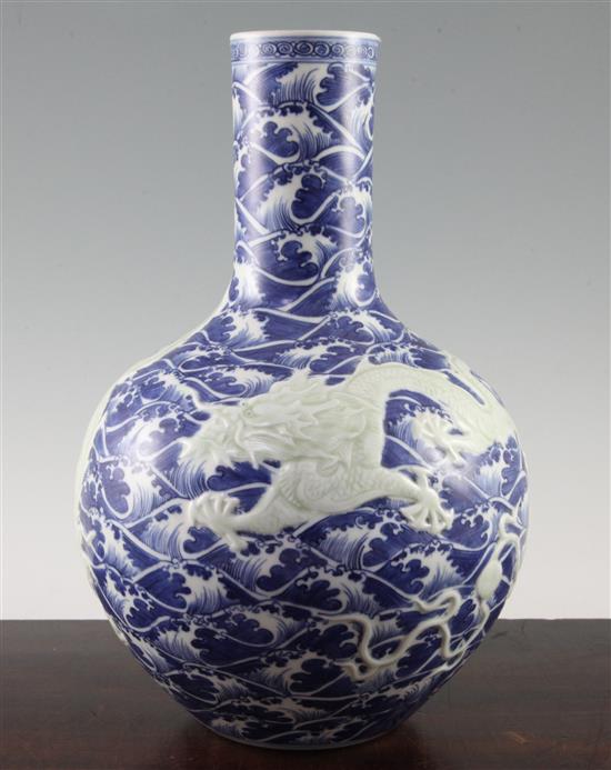 A Chinese blue and white dragon vase, 34cm